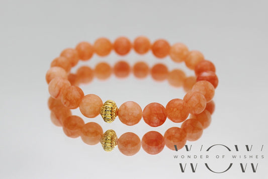 Perlenarmband in orange mit einem goldenen, nickelfreien Zwischenstück